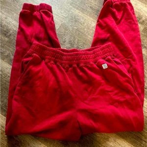 Womens nearly new American Eagle Tailgate red sweat pants in medium.
